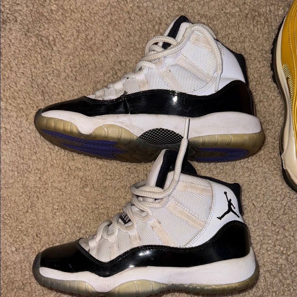 Jordan Kids Black and White High-Top Sneakers